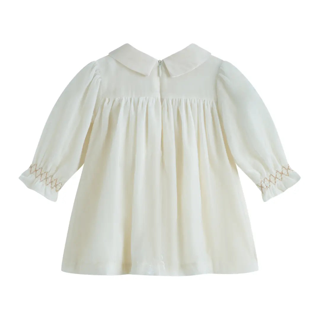 White dress with long sleeves on a white background