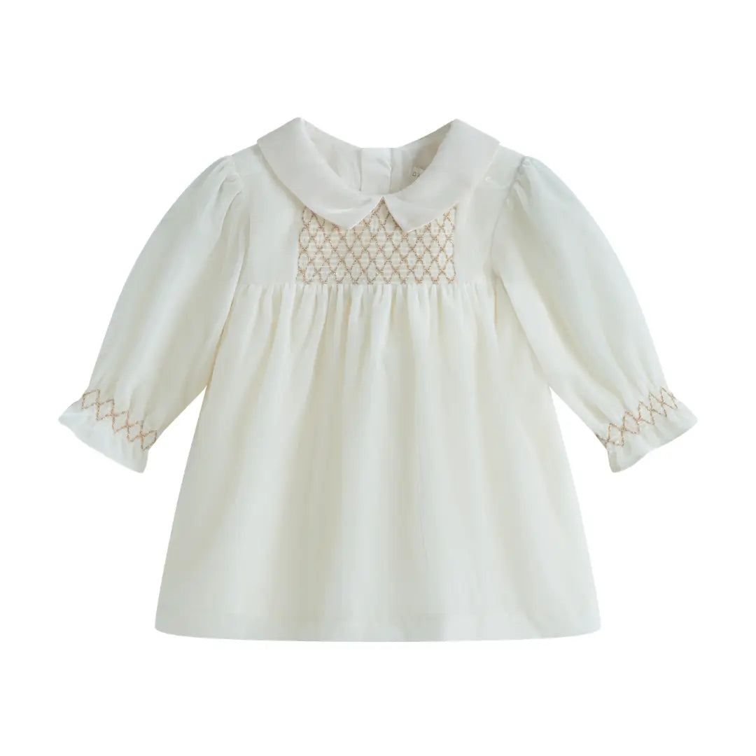 White blouse with lace details on a white background