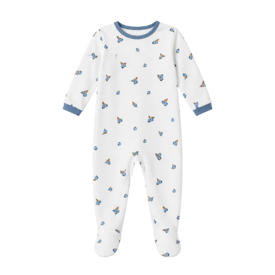 A flat-lay view of the Coton Pompom blueberry bambino footie in ivory.