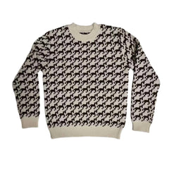 A front view of the Cottier brown knit sweater for children.