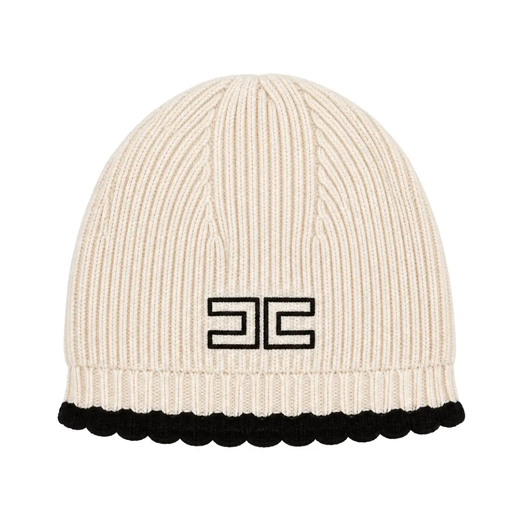 A flat-lay view of the Elisabetta Franchi knit cap in butter yellow with black trim.