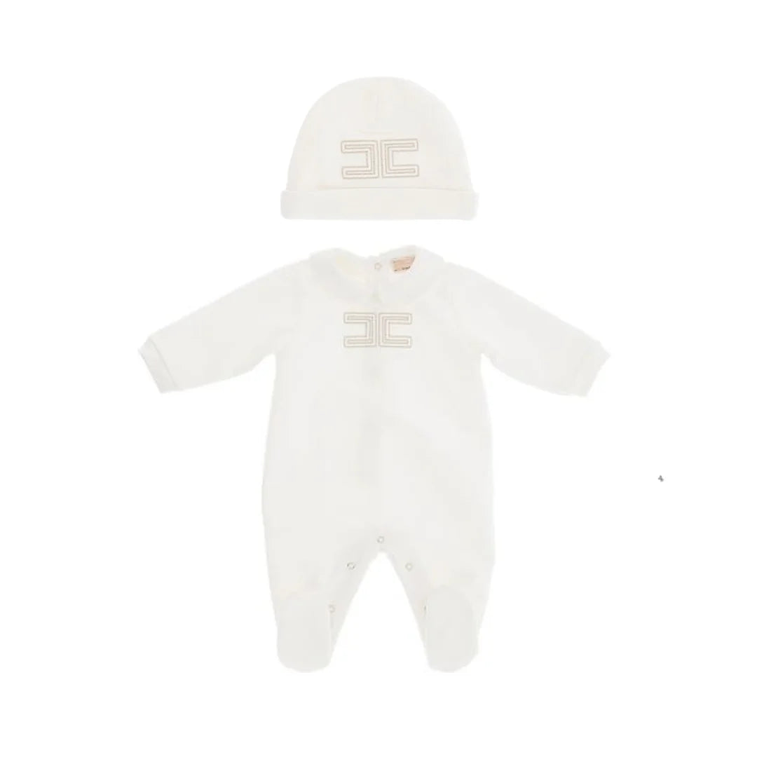 A baby two-piece outfit set featuring a long-sleeve footless onesie and a matching beanie hat, both in off-white with a beige embroidered double-C logo on the chest.