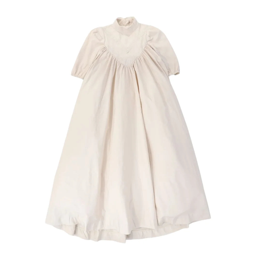 A front view of the Francesca Guiliano taffeta and lace V design formal gown.
