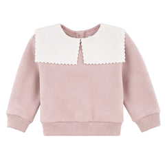A front view of the soft pink Petit Bateau Clarita baby pullover, highlighting the sailor-style collar.