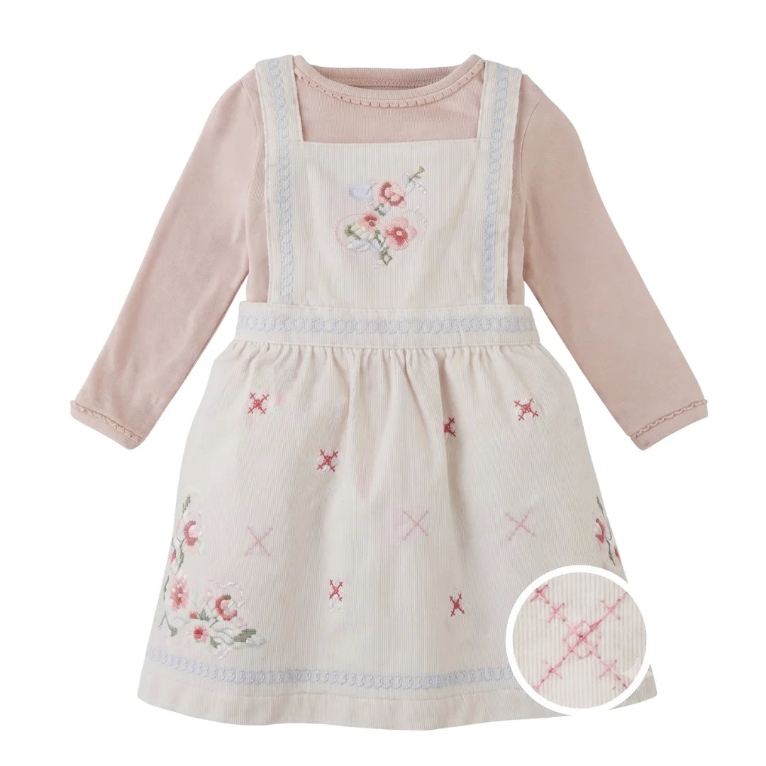 A front view of the Gingersnaps Baby Vera dress and tee set with delicate cross-stitch details.
