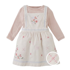 A front view of the Gingersnaps Baby Vera dress and tee set with delicate cross-stitch details.