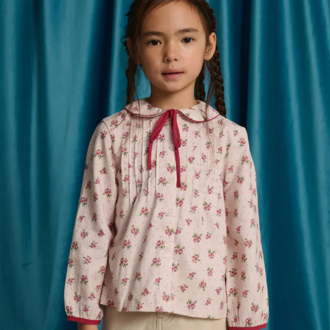 Little Girl wearing the Gingersnaps Caridad Pink Blouse