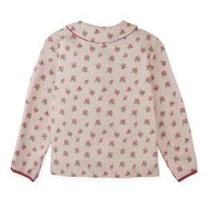 The clean back view of the comfortable children's floral top.
