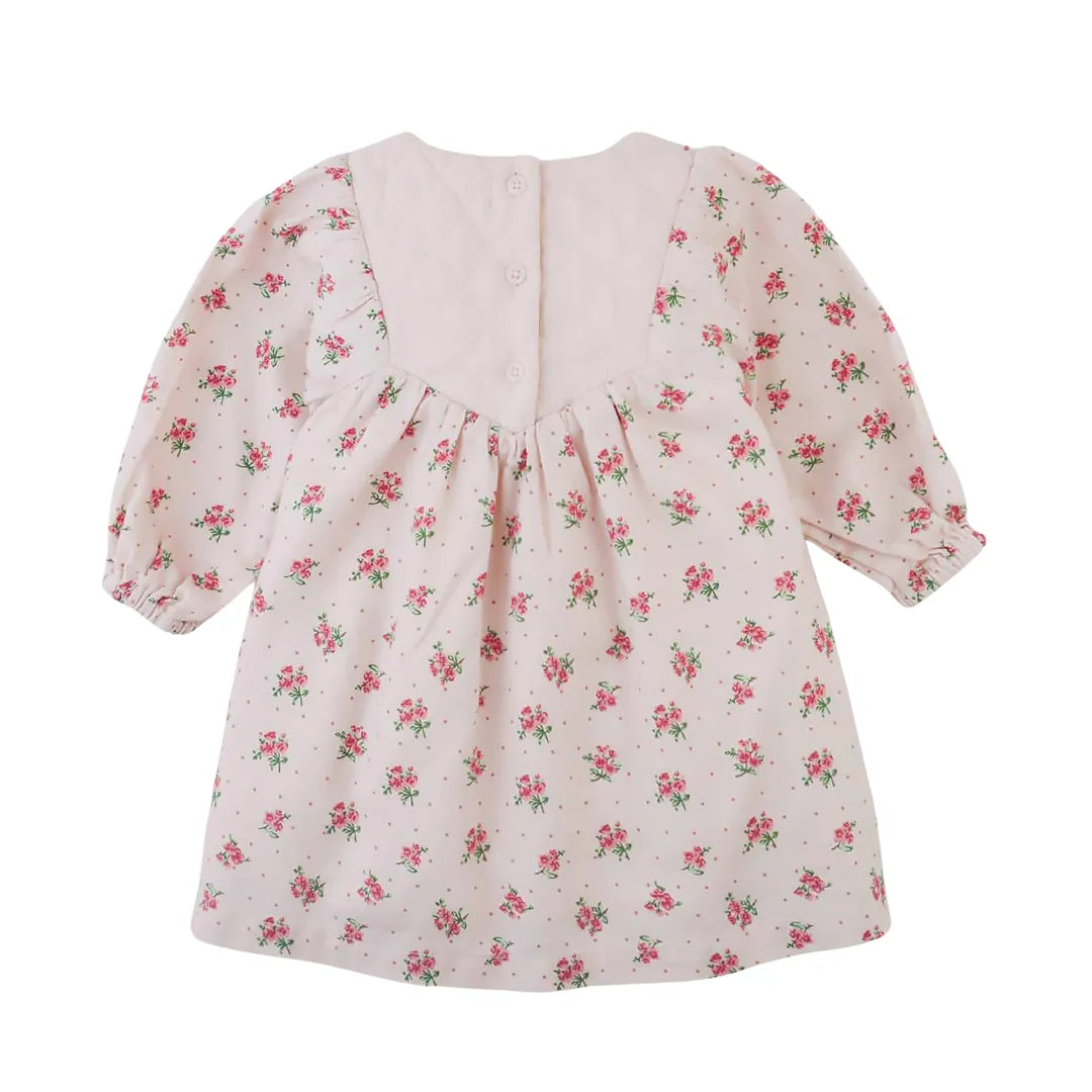 The clean back view of the Gingersnaps floral baby dress.