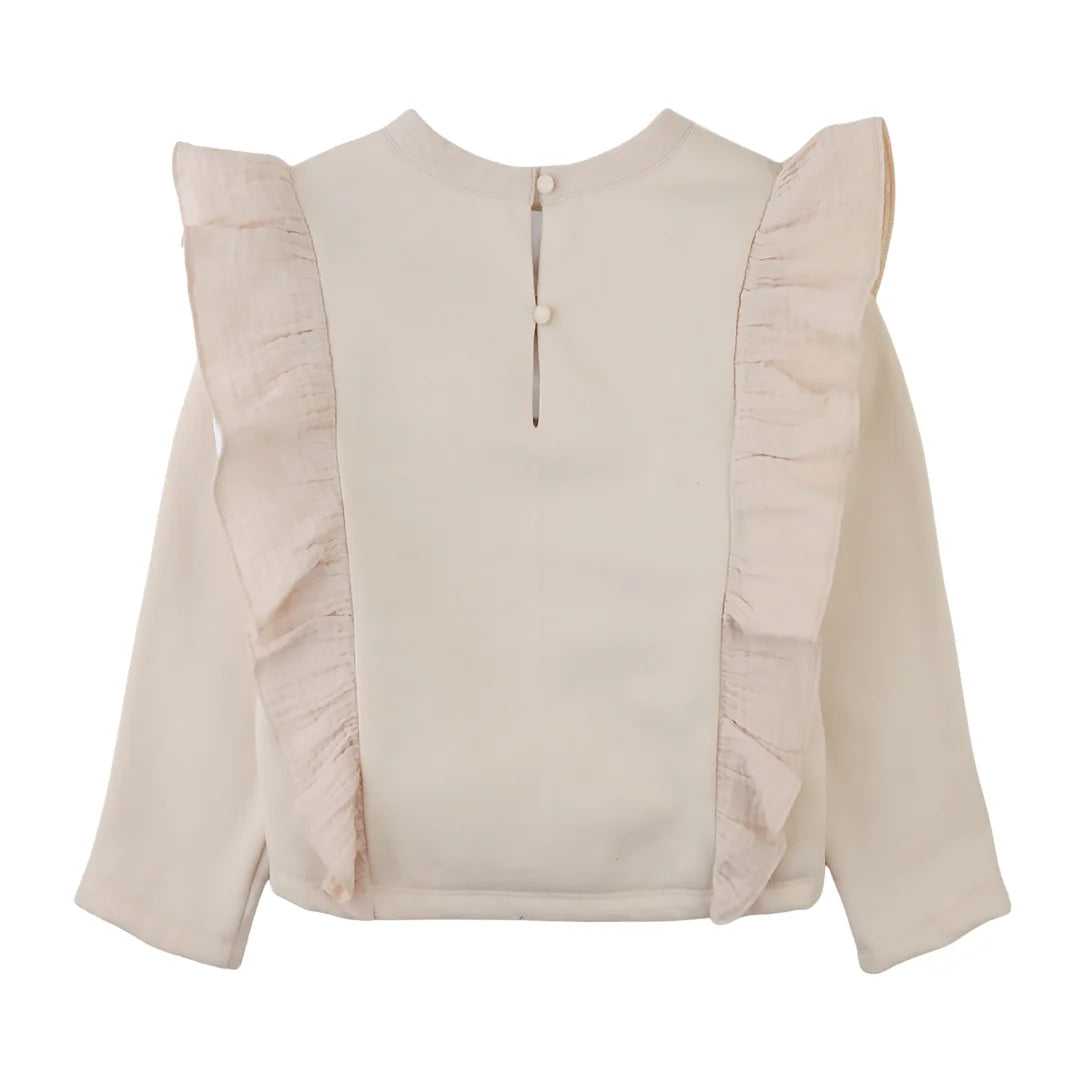 The back view of the neutral beige Gingersnaps girls top, showing its clean and simple cut.