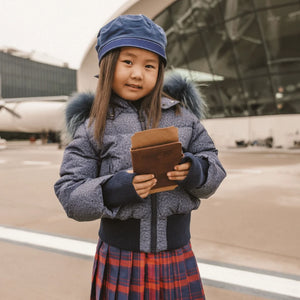 A front view of the Ibis Outerwear tall waistband coat in dark denim.