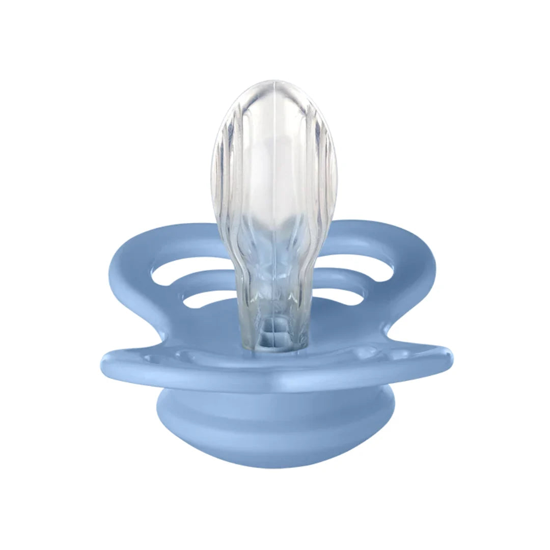 Blue baby pacifier with a clear silicone tip on a white background