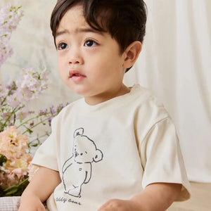 kid wearing tshirt with teddy bear print