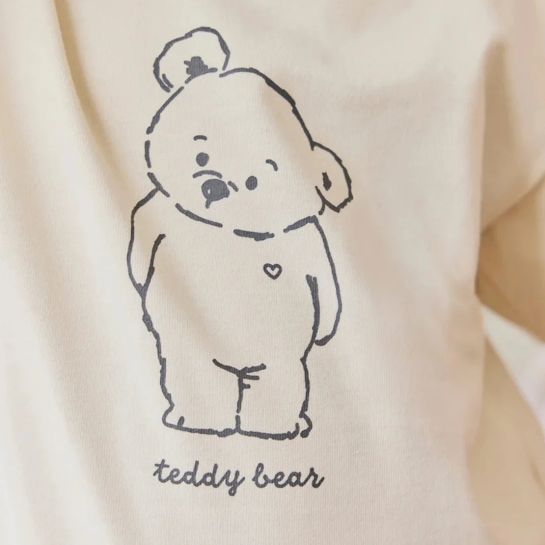 teddy bear print on shirt close up