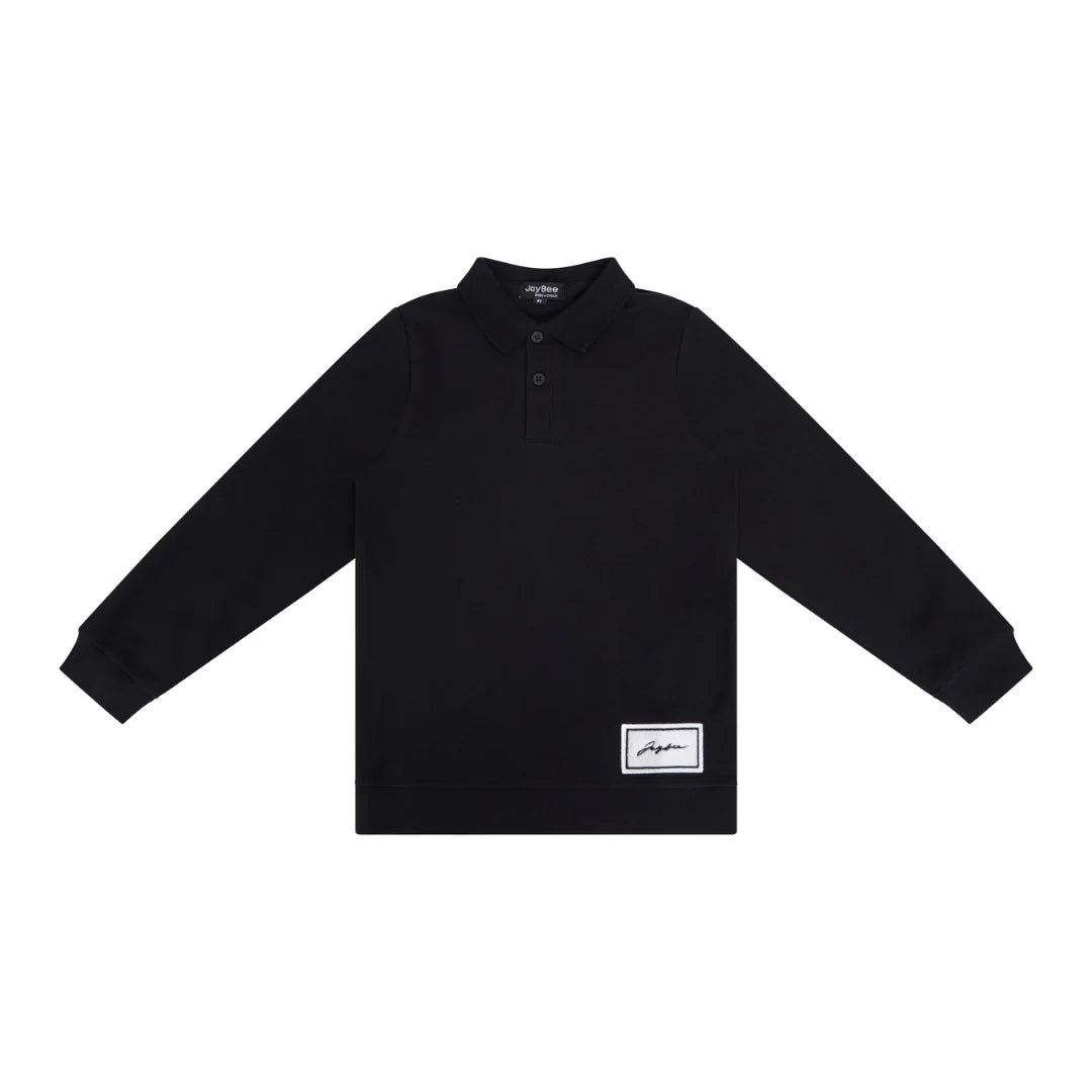 A front view of the JayBee black sherpa patch children's polo shirt.