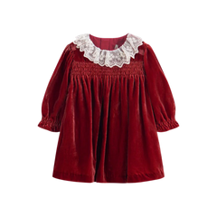 Red velvet dress with lace collar on a white background