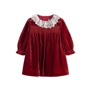 Red velvet dress with lace collar on a white background