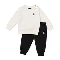 A front view of the John Richmond off-white and black designer sweatshirt set.