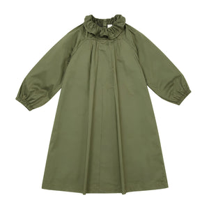 Green dress with a ruffled neckline on a white background