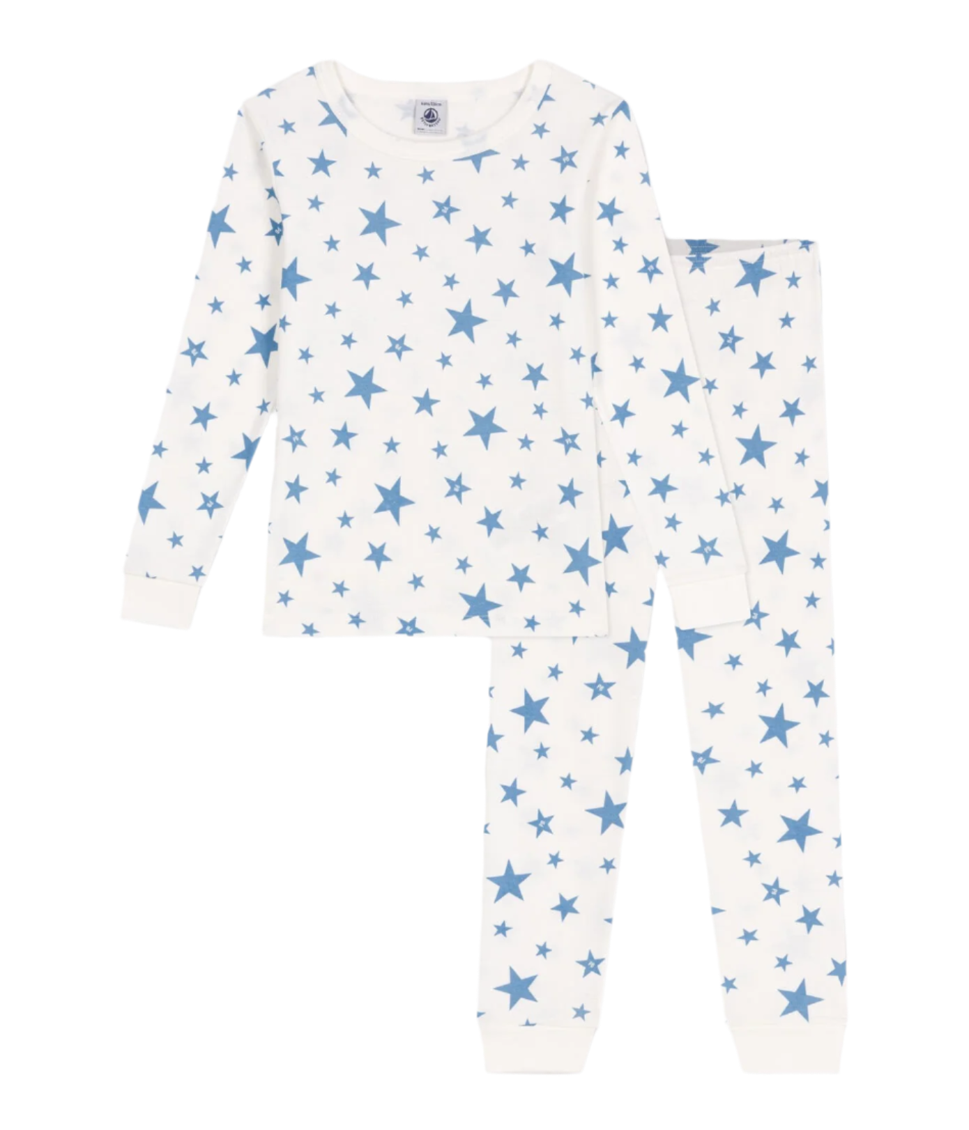Petit Bateau white loungewear set with blue stars print, made from soft organic cotton, laid flat on a neutral background