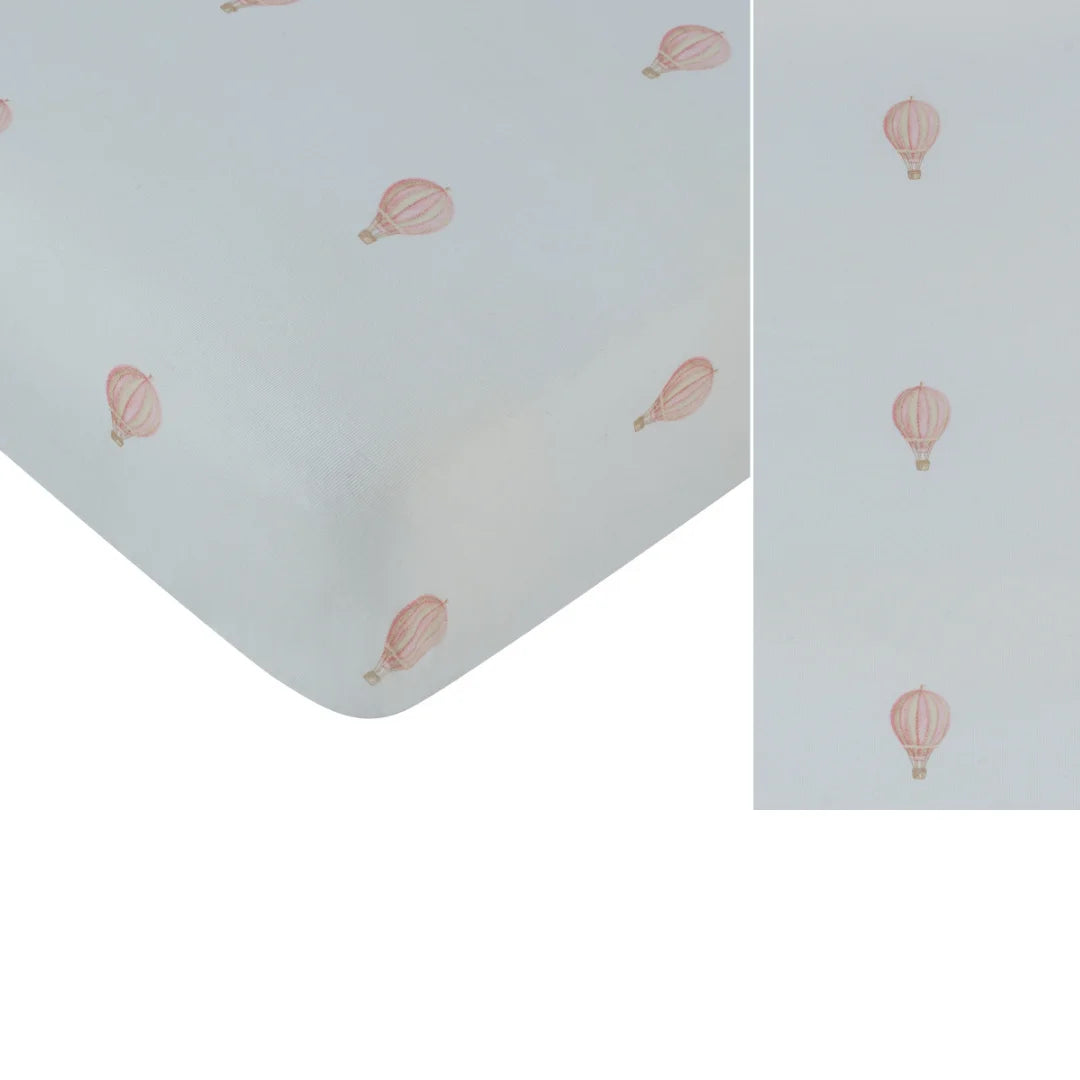 A front view of the Kipp blue and pink ciel enfant fitted bassinet sheet.
