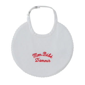 A front view of the Kipp red mon bebe baby feeding bib.