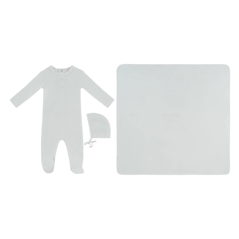 A front view of the Kipp white mon bebe baby footie, hat, and blanket set.