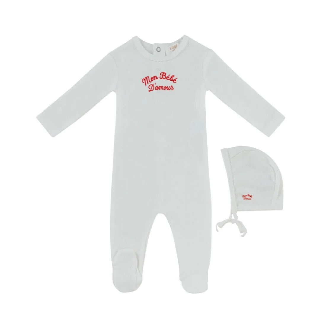 A front view of the Kipp red mon bebe baby footie and hat set.
