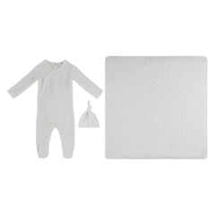 A front view of the Kipp pink baby stripe stamp footie, hat, and blanket set.
