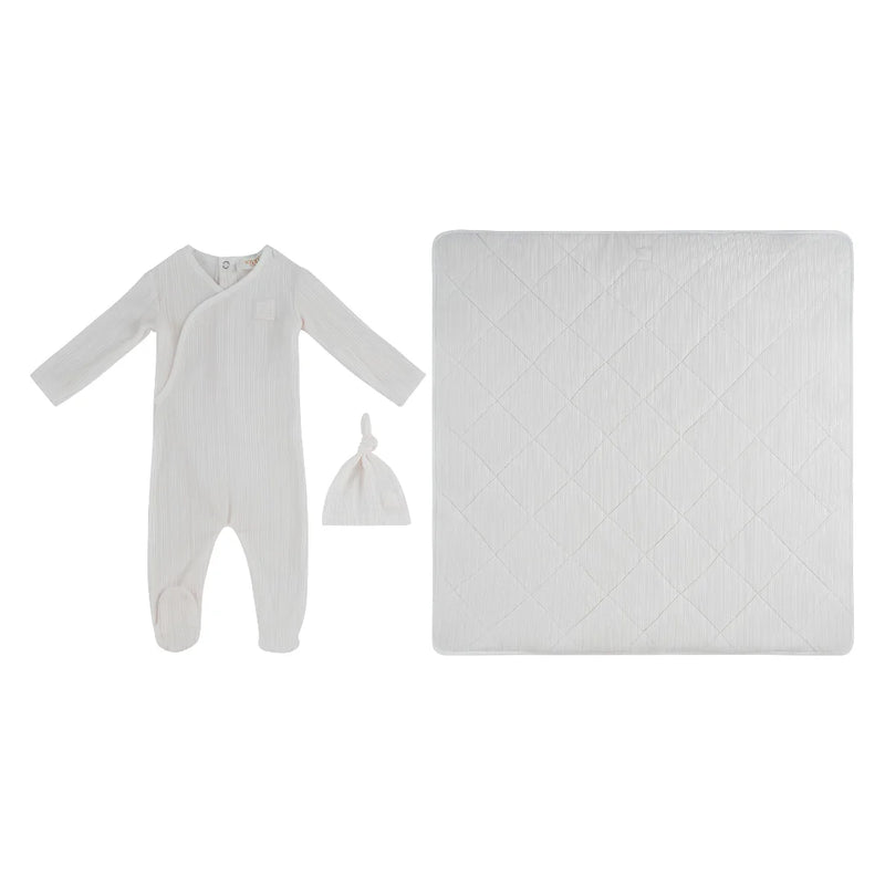 A front view of the Kipp pink baby stripe stamp footie, hat, and blanket set.