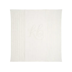 A full view of the Kipp baby white pointelle knit blanket.