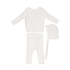 A front view of the Kipp baby white pointelle knit set with hat.