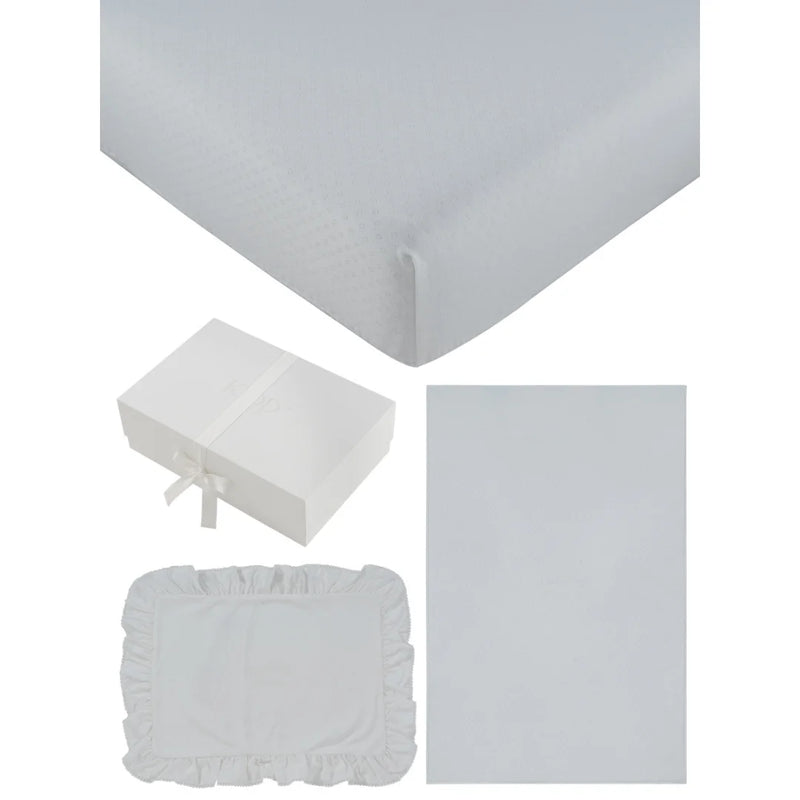 A front view of the Kipp white mon bebe mini 4-piece crib bedding set.
