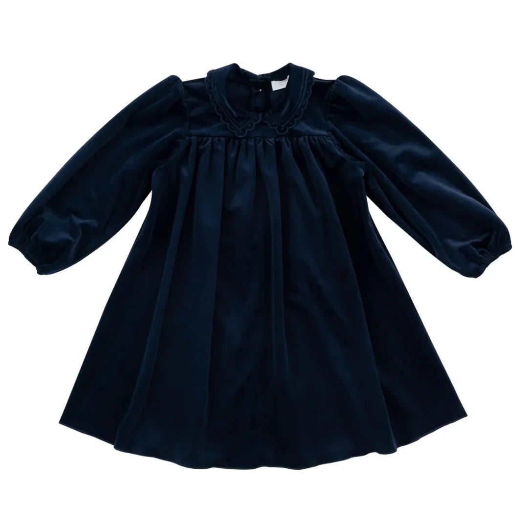 A front view of the Kipp navy velvet Nola dress.