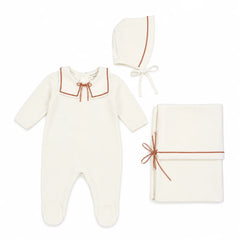 Studio front view of the La Mascot ivory and pink sailor layette 3-piece set.