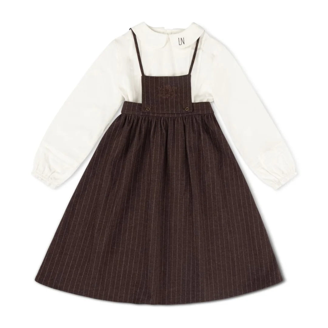 A front view of the La Nina brown pinstripe jumper and logo shirt set.
