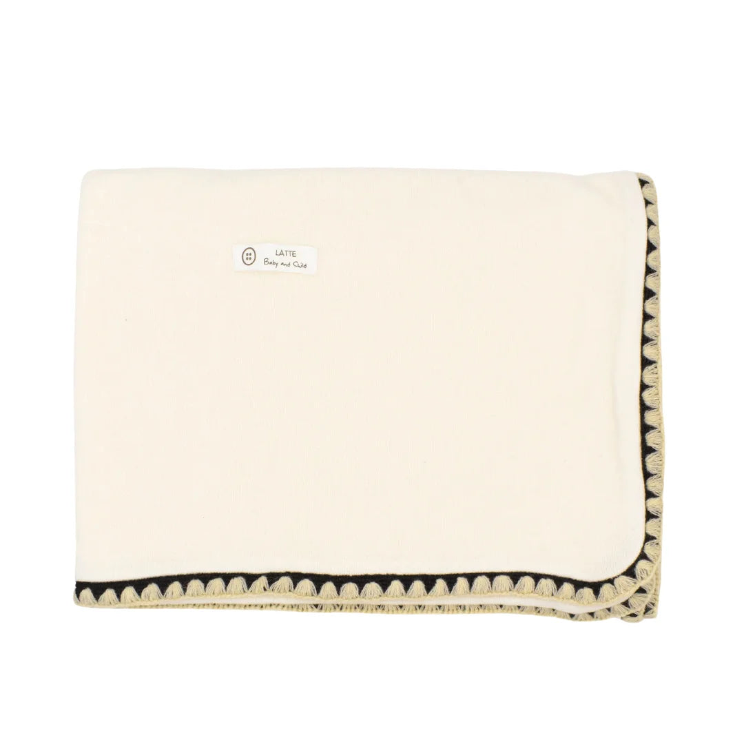 A front view of the elegant ivory Latte Carousel Stitching Blanket.