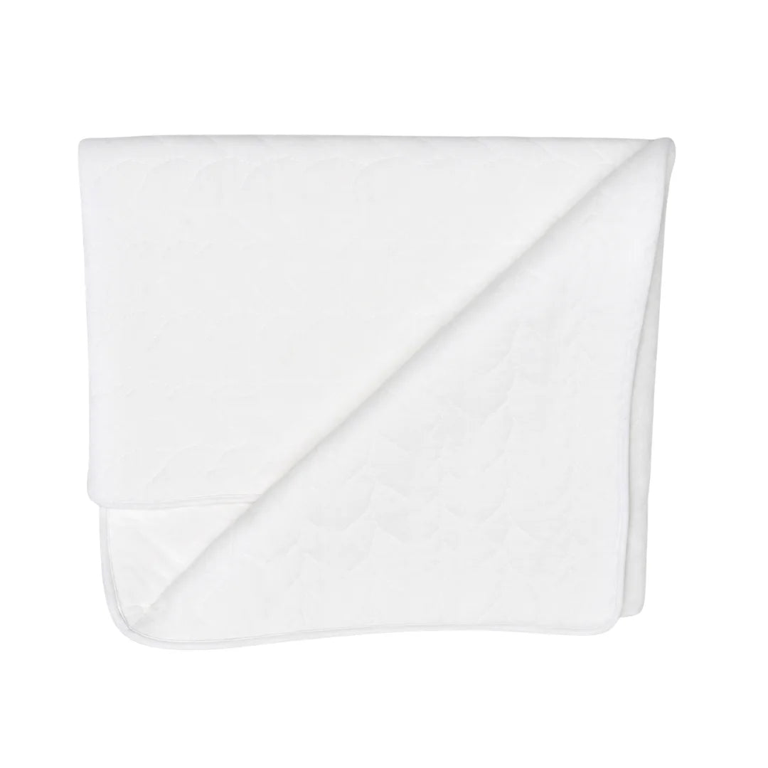 A front view of the elegant Latte Treccia Quilted Blanket.