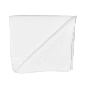 A front view of the elegant Latte Treccia Quilted Blanket.