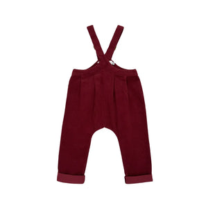 A front view of the Lillies Dream beetroot gingham children's suspender pants.