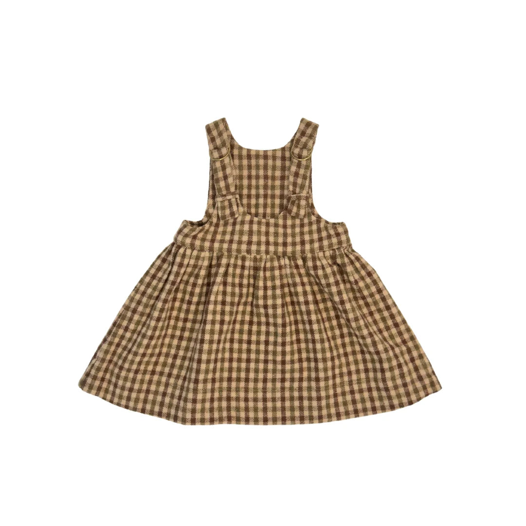 The clean back view of the comfortable toddler gingham dress.