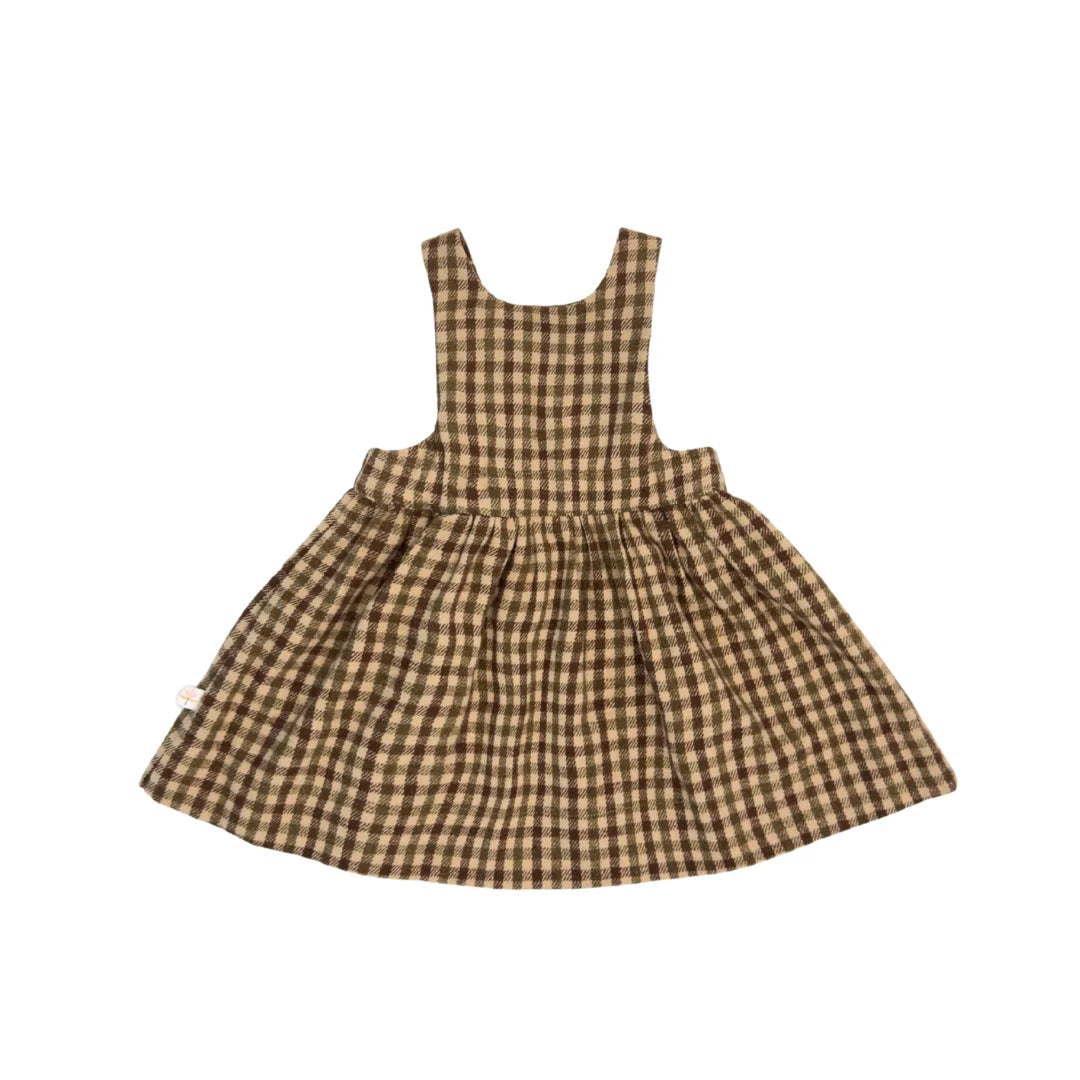 A front view of the Lillies Dream oak gingham children's pinafore dress.