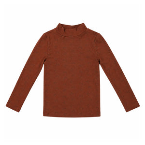 The clean back view of the comfortable mockneck top.
