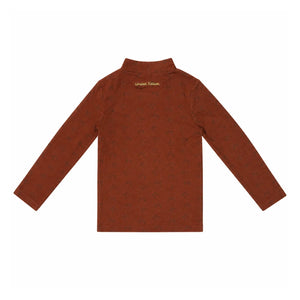 A front view of the limited edition brick bow print mockneck children's top.