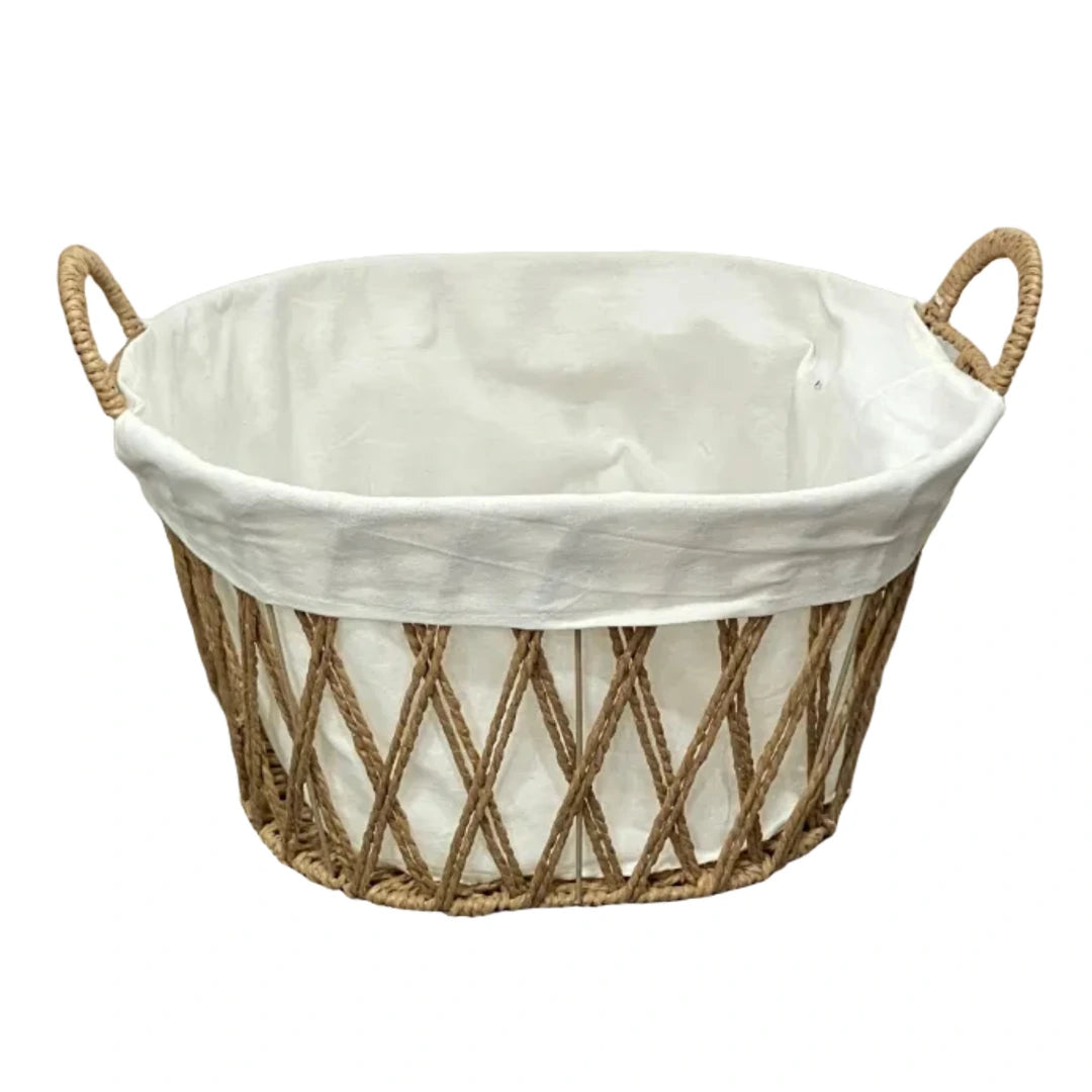 A sophisticated Lined Wicker Storage Basket with a crisp white cotton liner, showcasing its architectural weave and premium hand-crafted detail.