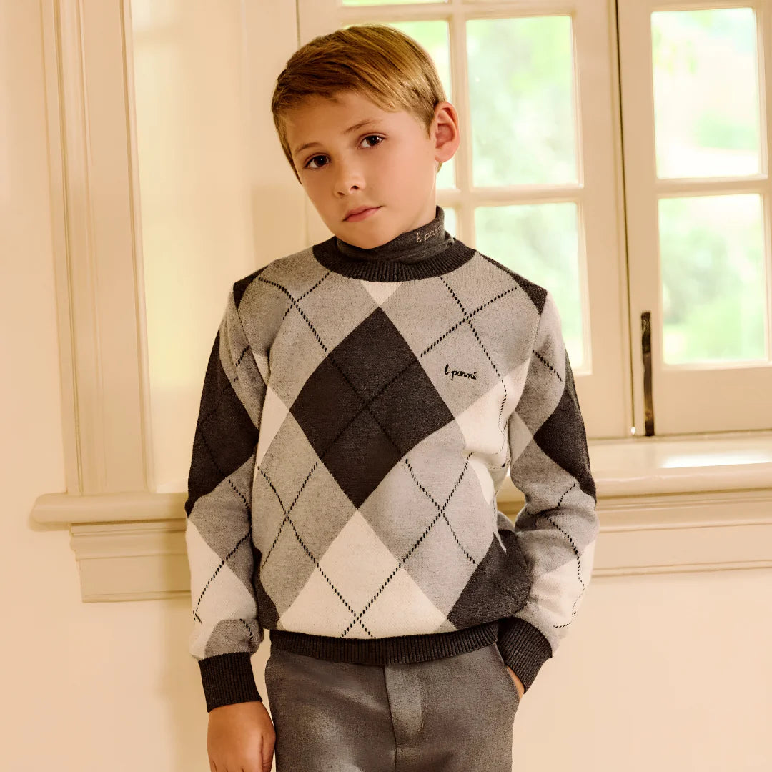 child styled in the Little Parni boys' argyle sweater 