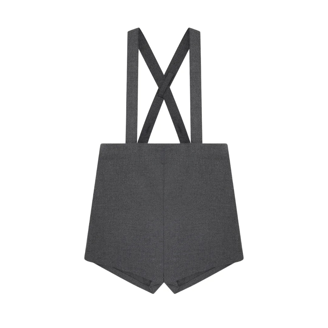 A front view of the Little Parni boys suspender shorts in grey.