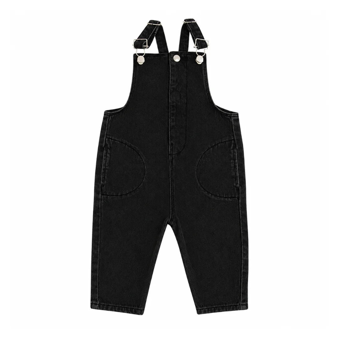 front view of the Little Parni black denim long overalls.