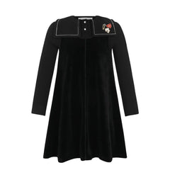A front view of the Little Parni embroidered collar velour maxi in black.