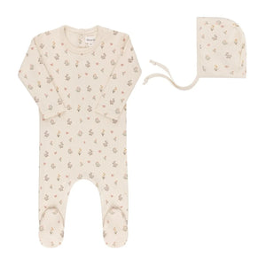 A breathtaking Little Parni Floral Layette Set including footie, beanie, and bib, showcasing its authoritative architectural fit and refined botanical print.